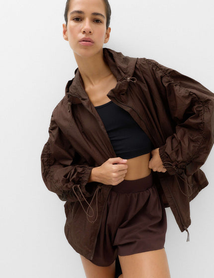 Goodmove Stormwear Shimmer Lightweight Hooded Jacket - Dark Chocolateimages1- The Sports Edit