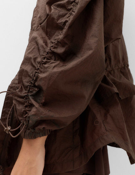 Goodmove Stormwear Shimmer Lightweight Hooded Jacket - Dark Chocolateimages3- The Sports Edit